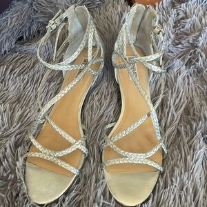 Silver sandals…. With a tasseled zipper